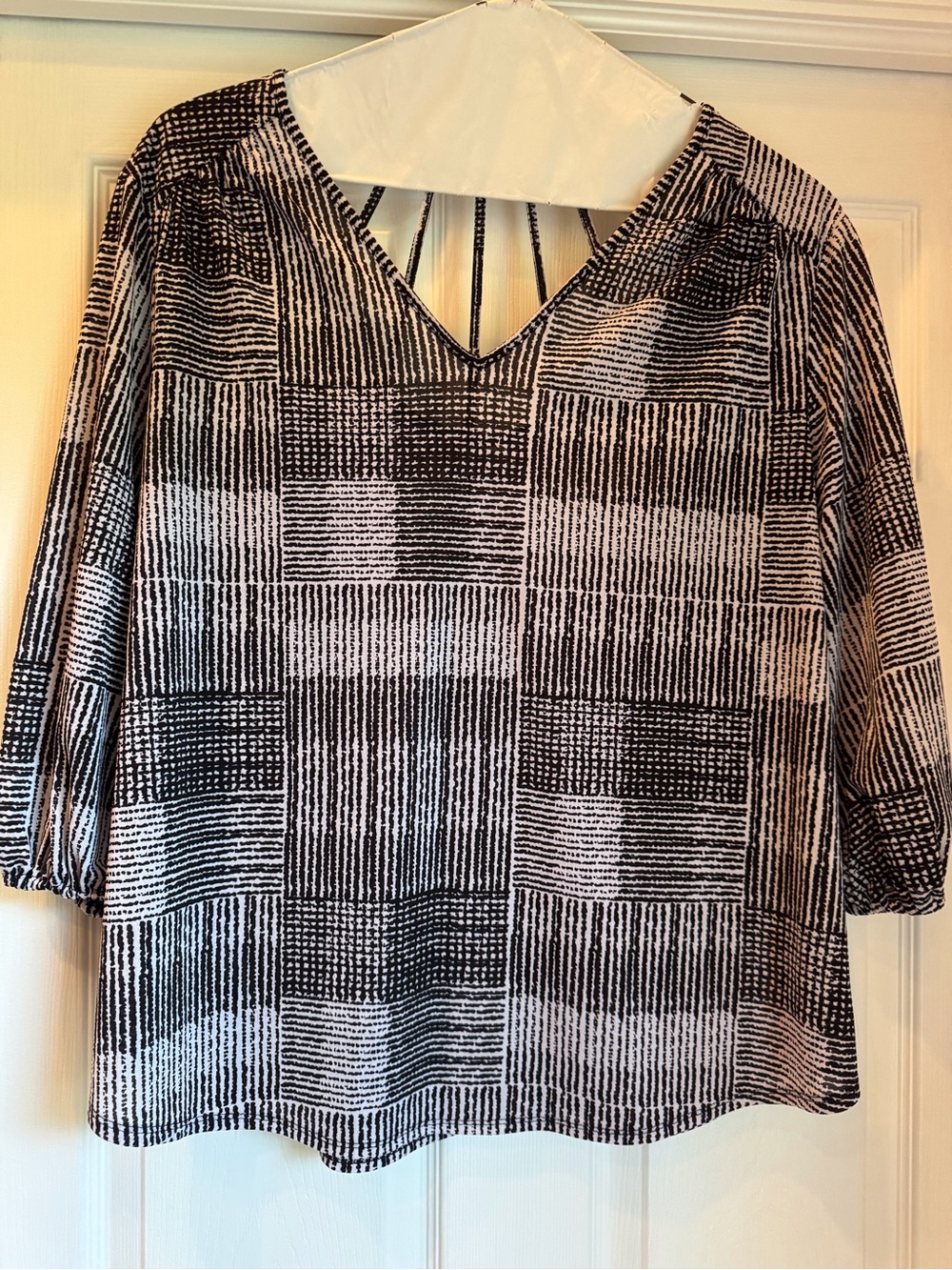 Black and White Geometric V-Neck Blouse